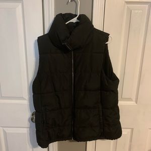 black zipper puffer vest.